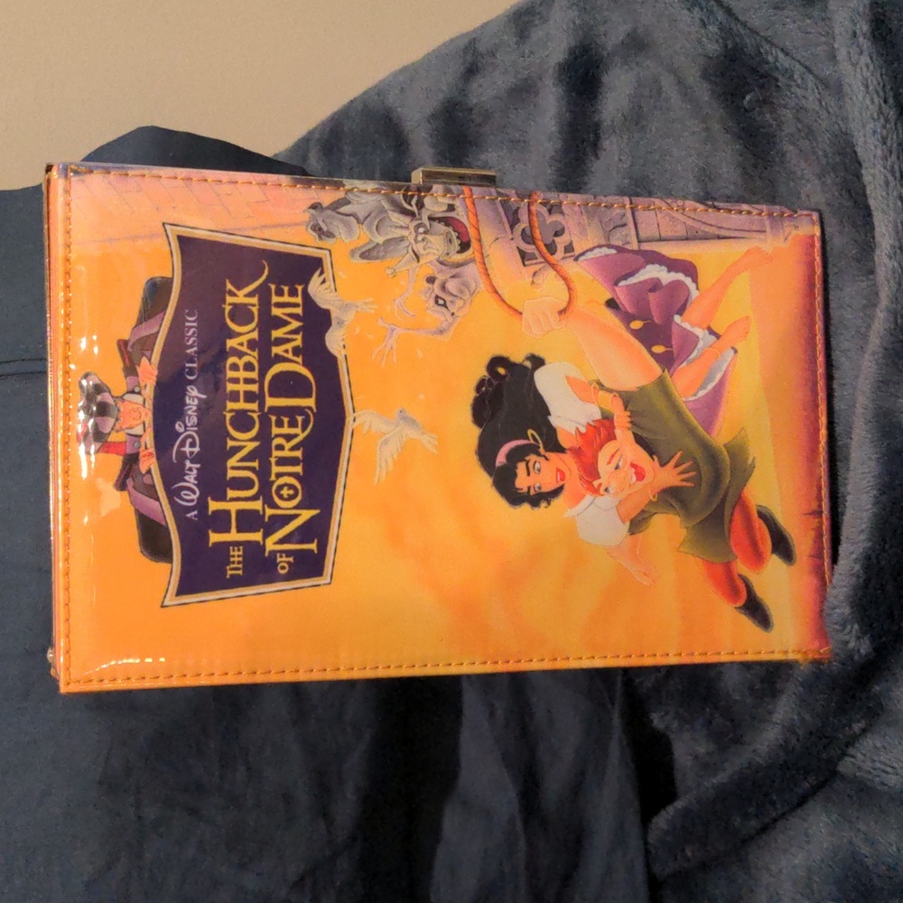 Oh yeah Disney plastic covering hunchback of Notre Dame VHS clutch purse
